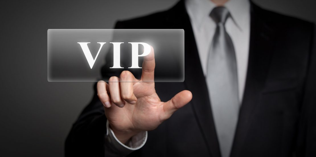 businessman pressing virtual button - VIP